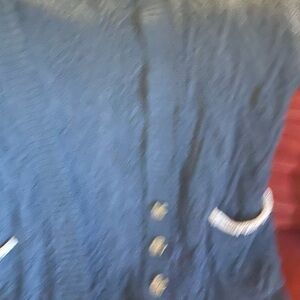 Beautiful blue sweater by Free People size Small  Front buttons.